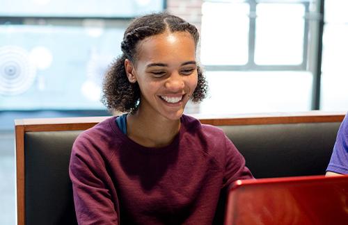 girl at computer in student union